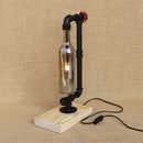 Vintage industrial desk lamp with bottle-shaped shade