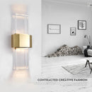 Minimalist stainless steel and crystal wall light