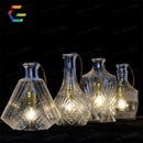 Vintage LED pendant light with carved glass shade