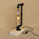 Vintage industrial desk lamp with bottle-shaped shade