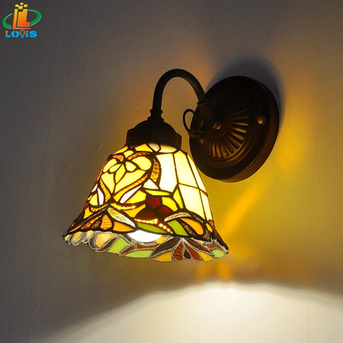 Antique tiffany wall light with floral motif for decorative lighting