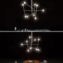 Lightweight metal chandelier with elegant glass spheres