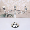 Retro metal three-arm candle holder for events and decorations