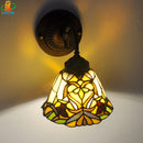 Antique tiffany wall light with floral motif for decorative lighting
