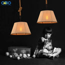 Vintage pendant light in hemp rope and iron for cafés and bars