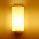 Modern wooden wall light with night light and frosted shade