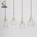 Vintage LED pendant light with carved glass shade