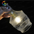 Vintage LED pendant light with carved glass shade