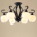 Vintage wrought iron ceiling light with elegant glass shade