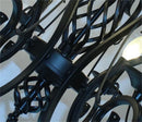 Classic vintage chandelier with 6 or 8 candle lights in wrought iron