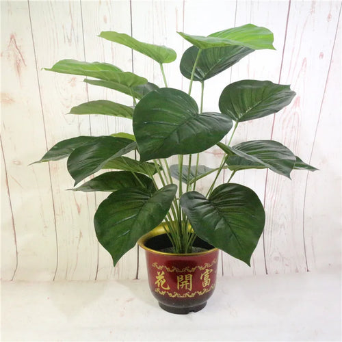 Artificial tropical monstera plant for indoor decoration