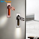 Wall reading light with integrated spotlight