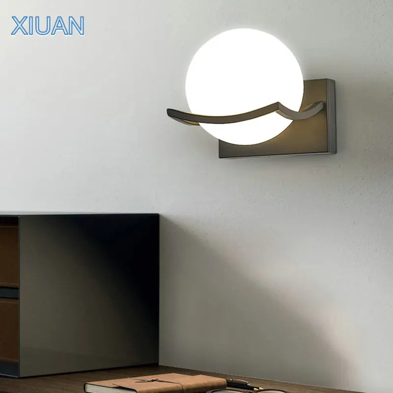 Simple modern glass and metal wall light