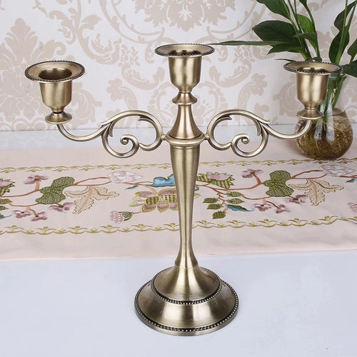 Retro metal three-arm candle holder for events and decorations