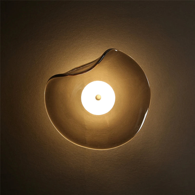 Modern LED glass wall light with curved surface lighting