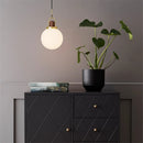 Nordic glass pendant light in minimalist style for modern interiors
