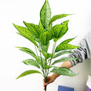 Artificial monstera plant with decorative tropical leaves for indoor garden
