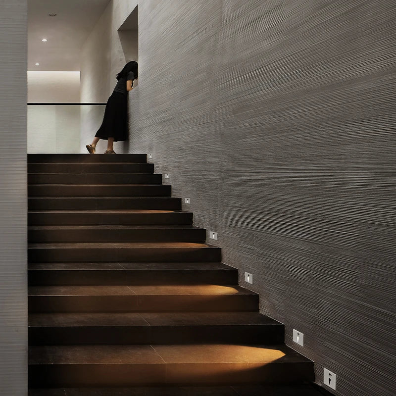 Led wall light with integrated sensor