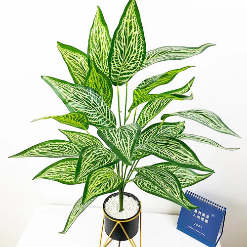 Artificial monstera plant with decorative tropical leaves for indoor garden - vue 4 sur 13