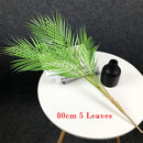 Artificial palm bouquet for festive Hawaiian decoration
