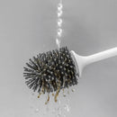 Long-handled silicone wall-mounted cleaning brush