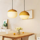 Modern round LED chandelier in wood and wrought iron