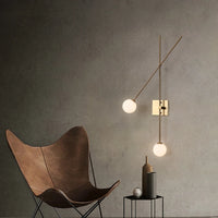 Minimalist glass wall light for modern interiors