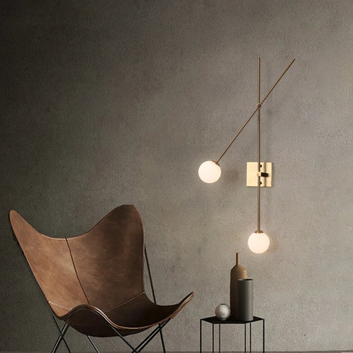 Minimalist glass wall light for modern interiors