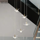 Modern bird pendant light in copper and acrylic