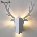 Modern antler wall light for interior decor