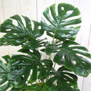 Artificial tropical monstera plant for indoor decoration