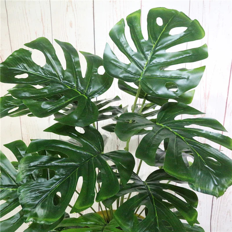 Artificial tropical monstera plant for indoor decoration