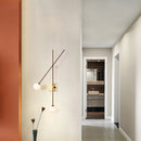 Minimalist glass wall light for modern interiors