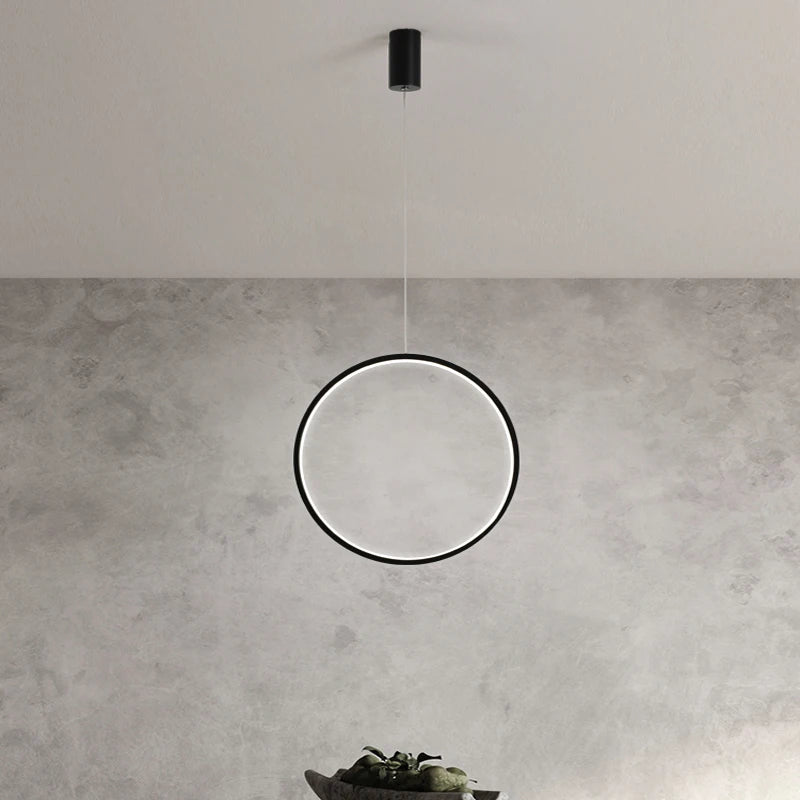 Modern circular pendant light ideal for bar or kitchen