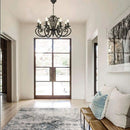Vintage wrought iron chandelier with metal candle lights
