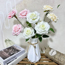Silk floral decoration with roses and branches for parties