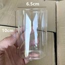 Transparent glass cup-shaped candle holders for festive home decoration