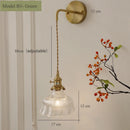 Vintage glass wall light with brass socket