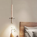 Cylindrical marble and gold metal pendant light for modern interiors