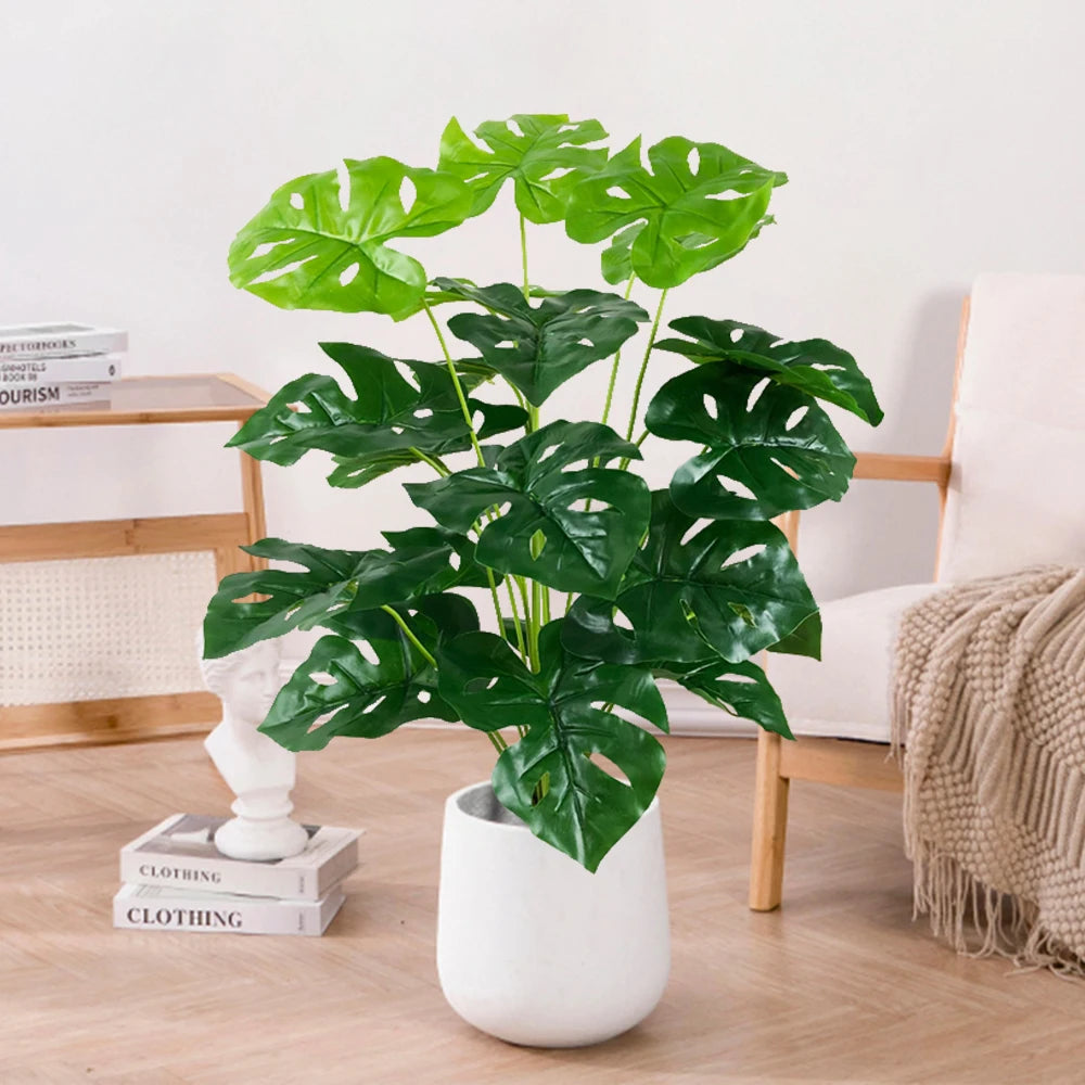 Artificial tropical palm with banana leaves for indoor decoration