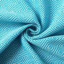 Serviette de plage coton motif jacquard losanges pompons