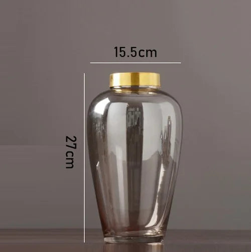 modern glass vase with metal base for floral decoration