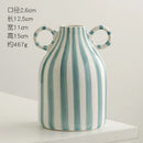 hand painted ceramic vase with fun decorative ears