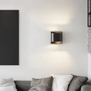 Modern brass LED wall light