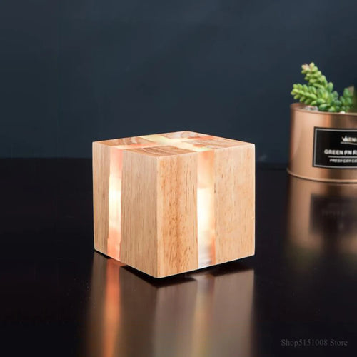 Handmade solid wood and resin LED wall light