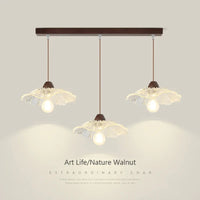 Nordic glass and wood pendant light for decorative interiors