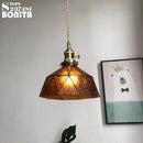 Pure glass pendant light with wave copper design