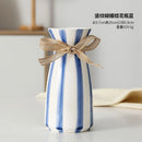 modern ceramic vase with bow for dried flowers