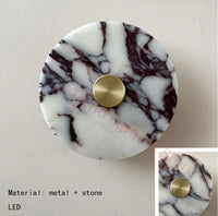 Art deco style wall light in stone and gold metal