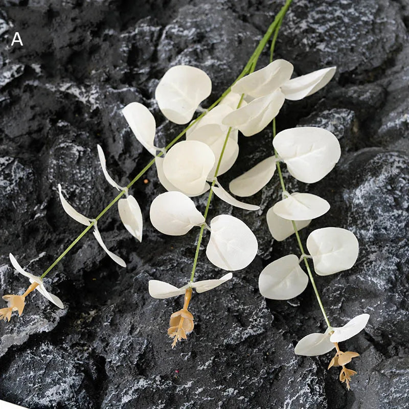 Artificial eucalyptus leaves and flowers for decorations and floral arrangements
